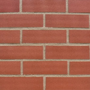 A display panel image of bricks bonded in stagger bond. The brick slips are mid red with a sanded surface, crisp edges and accurate dimensions