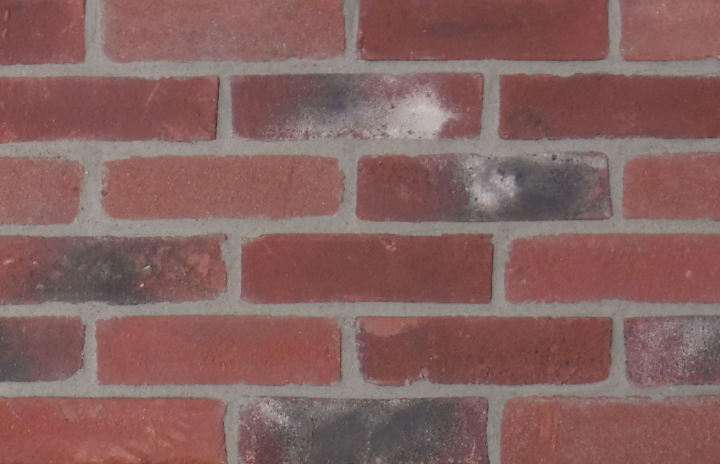Brighton Blend brick slips pointed with grey coloured mortar.